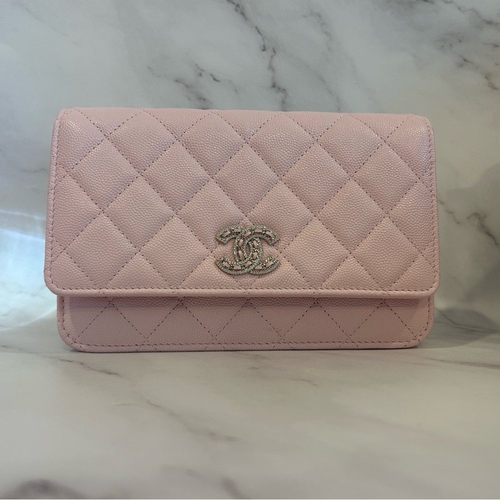 CHANEL Light Pink Wallet on Chain in caviar leather